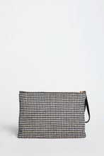 Load image into Gallery viewer, HAND-HELD CLUTCH IN A HOUNDS-TOOTH PRINT WITH GOLDEN LOGO