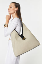 Load image into Gallery viewer, BASKET-WEAVE TRAPEZE BAG WITH GOLD CG LOGO