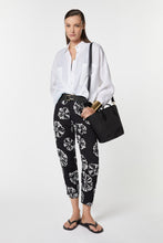 Load image into Gallery viewer, CARROT PANTS IN FLORAL-PRINTED VISCOSE WITH ELASTICATED WAISTBAND