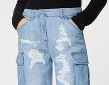 Load image into Gallery viewer, CARO SHORTS IN LIGHT WASH DENIM WITH RIPS AND BEJEWELLED DETAILS