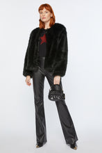 Load image into Gallery viewer, FAUX LEATHER FLARED TROUSERS
