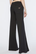Load image into Gallery viewer, FLARED JEANS IN STRETCH COTTON GABARDINE WITH CRÊPE DE CHINE EMBELLISHMENTS ON THE SIDES 

