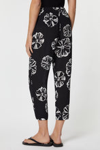 Load image into Gallery viewer, CARROT PANTS IN FLORAL-PRINTED VISCOSE WITH ELASTICATED WAISTBAND
