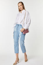 Load image into Gallery viewer, CARGO PANTS IN LIGHT WASH DENIM WITH ANKLE ZIPPERS, RIPS AND BEJEWELLED DETAILS
