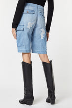 Load image into Gallery viewer, CARO SHORTS IN LIGHT WASH DENIM WITH RIPS AND BEJEWELLED DETAILS

