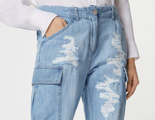 Load image into Gallery viewer, CARGO PANTS IN LIGHT WASH DENIM WITH ANKLE ZIPPERS, RIPS AND BEJEWELLED DETAILS

